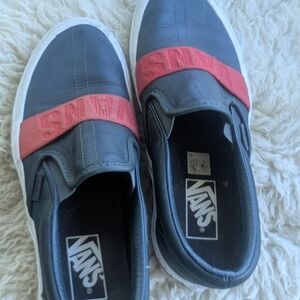 Vans Slip-On Sneakers in Black and Red